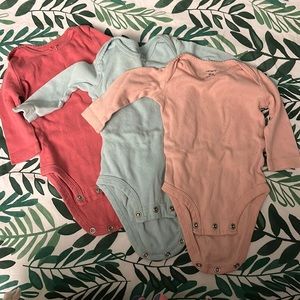 Bundle of three long sleeved onesies 0-3 months